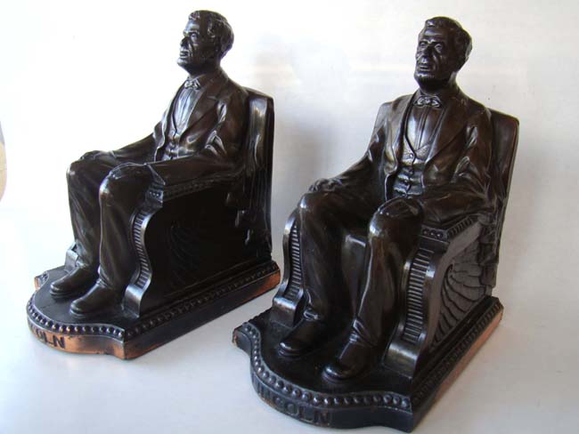 A fine pair of antique "Lincoln in the chair" bookends by Nuart made in 1924